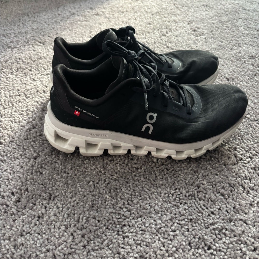 On Running Black Athletic Shoes with White Sole